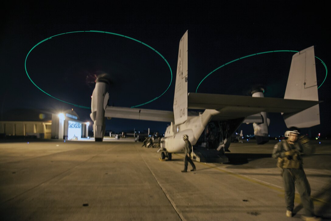 An MV-22B Osprey tiltrotor aircraft taxies to a stop after night aerial refueling training Nov. 7 at Marine Corps Air Station Futenma. The Marines flew two aerial refueling missions on both Oct. 30 and Nov. 7 in day light and low-light conditions. The Osprey and crew are with Marine Medium Tiltrotor Squadron 265 (Reinforced), currently assigned to the 31st Marine Expeditionary Unit, III Marine Expeditionary Force. (U.S. Marine Corps photo by Lance Cpl. Anne K. Henry/Released)