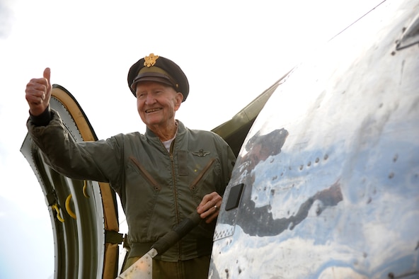 Retired Col. Gail Halvorsen gives thumbs up to the crowd prior to boarding a vintage C-47 Skytrain Nov. 9, 2013, at the South Texas Regional Airport in Hondo, Texas. More than 250 community members and servicemembers attended the event which featured rides on vintage aircraft, performances from the Texas Children’s Choir, the U.S. Air Force Band of the West, and a candy drop. 