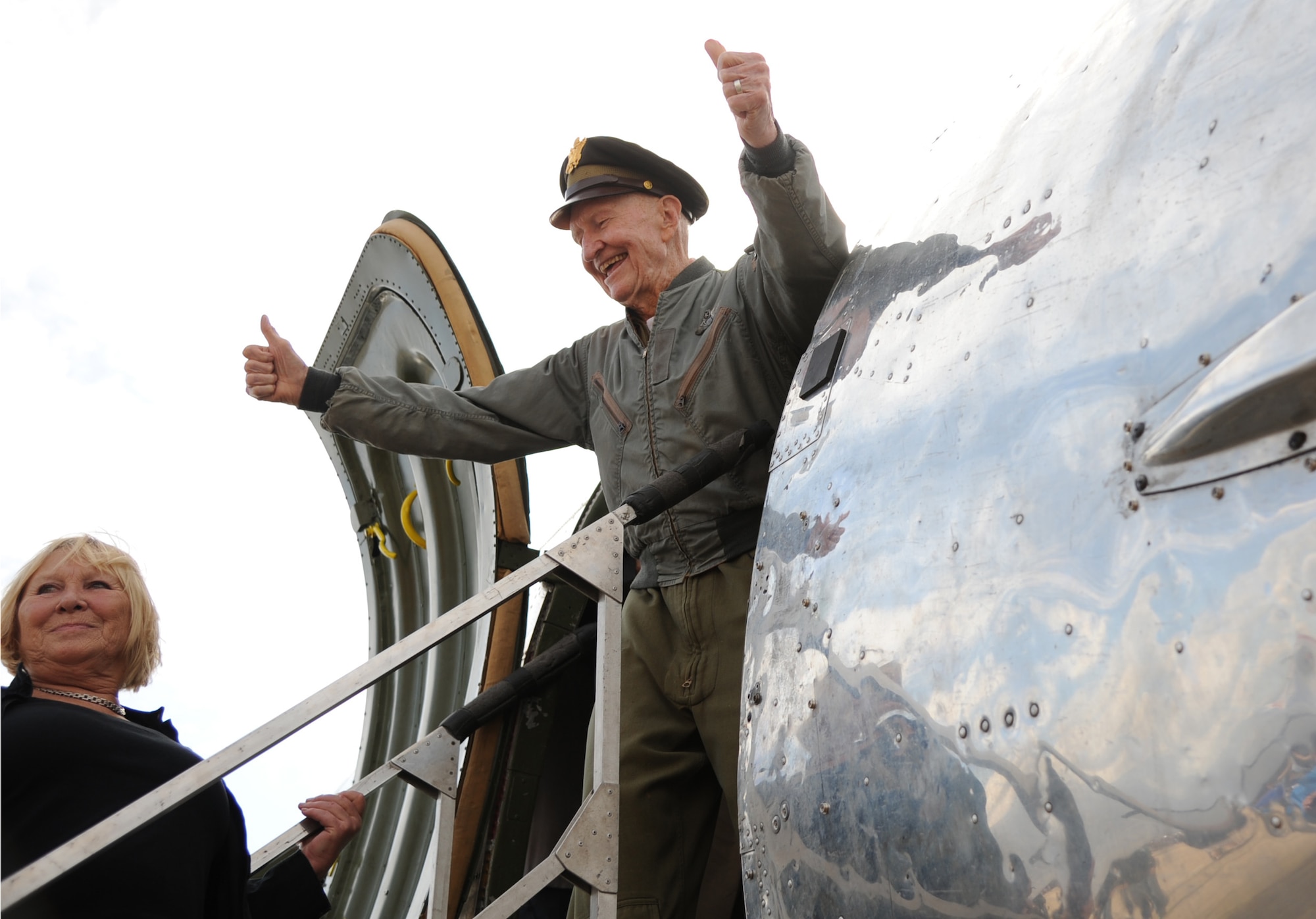Retired Col. Gail Halvorsen, known as the “Candy Bomber,” and Heike Jackson wave prior to boarding a vintage C-47 Skytrain Nov. 9, 2013, at the South Texas Regional Airport in Hondo, Texas. A German native, Jackson was a child in Berlin when Halvorsen began the candy drop operation in 1948. 