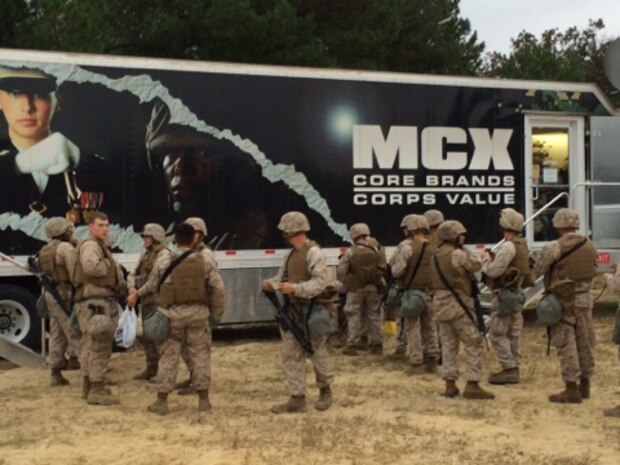 Marines wait outside of the Mobile Tactical Field Exchange during 10th Marine Regiment’s Exercise Rolling Thunder in Fort Bragg, N.C., recently. It was the first time the Mobile Tactical Field Exchange was set up outside of Marine Corps Base Camp Lejeune and its local installations. 