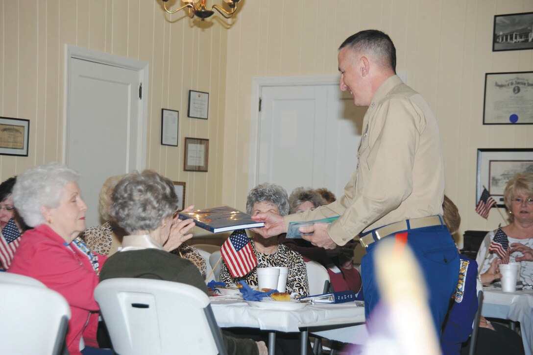 Col. Don Davis, commanding officer, Marine Corps Logistics Base Albany, speaks to members of the local Daughters of the American Revolution Chapter in honor of Veterans Day, Nov. 7.
