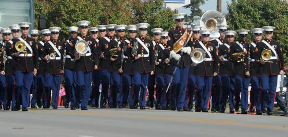 The 2nd Marine Division Band leads the 18th annual Jacksonville Veterans Parade, Nov. 9.  Thousands of community members lined the streets to honor and support past and present service members.