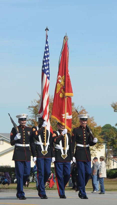 The 2nd Marine Division Color Guard marches with the Marine Corps Colors and national ensign during the 18th annual Jacksonville Veterans Day Parade, Nov. 9.

