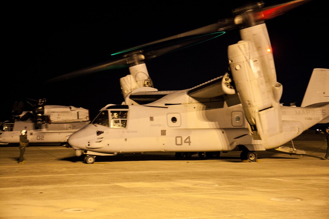 An MV-22B Osprey tiltrotor aircraft taxies to a stop after night aerial refueling training Nov. 7 at Marine Corps Air Station Futenma. The Marines flew two aerial refueling missions on both Oct. 30 and Nov. 7 in day light and low-light conditions. The Osprey and crew are with Marine Medium Tiltrotor Squadron 265 (Reinforced), currently assigned to the 31st Marine Expeditionary Unit, III Marine Expeditionary Force. (U.S. Marine Corps photo by Lance Cpl. Anne K. Henry/Released)