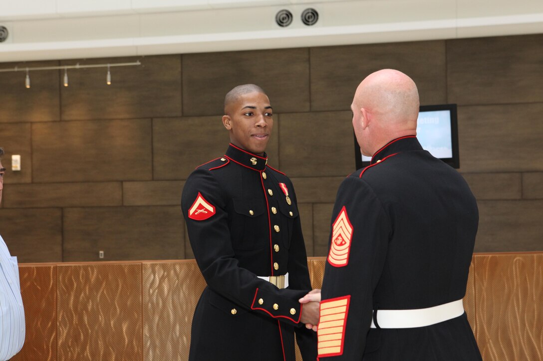 Sgt. Maj. Micheal P. Barrett, the 17th Sergeant Major of the Marine Corps, attends the National Geospatial-Intelligence Agency celebration of the Marine Corps’ 238th birthday as the guest of honor, on Nov. 8, 2013, at the William Allder Auditorium, in Springfield, Va. (U.S. Marine Corps photo by Sgt. Marionne T. Mangrum)