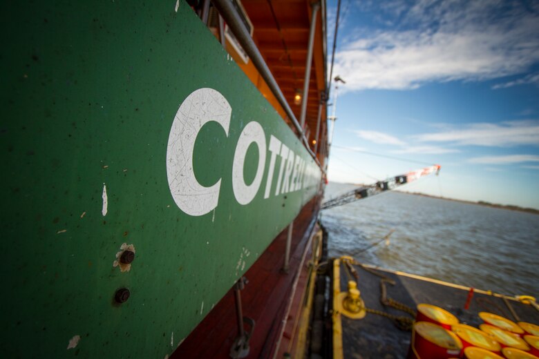 WILLIAMSBURG, Va. -- The crew of the Cottrell Contracting Corporation Dredge Marion works to remove shoals from the James River federal navigation channel just off shore from James City County, Va., Nov. 6 2013. The river plays a role in the economies of Richmond and Hopewell, providing a navigation channel of 25 feet deep for ships to move goods to and from the inland ports. (U.S. Army photo/Patrick Bloodgood)