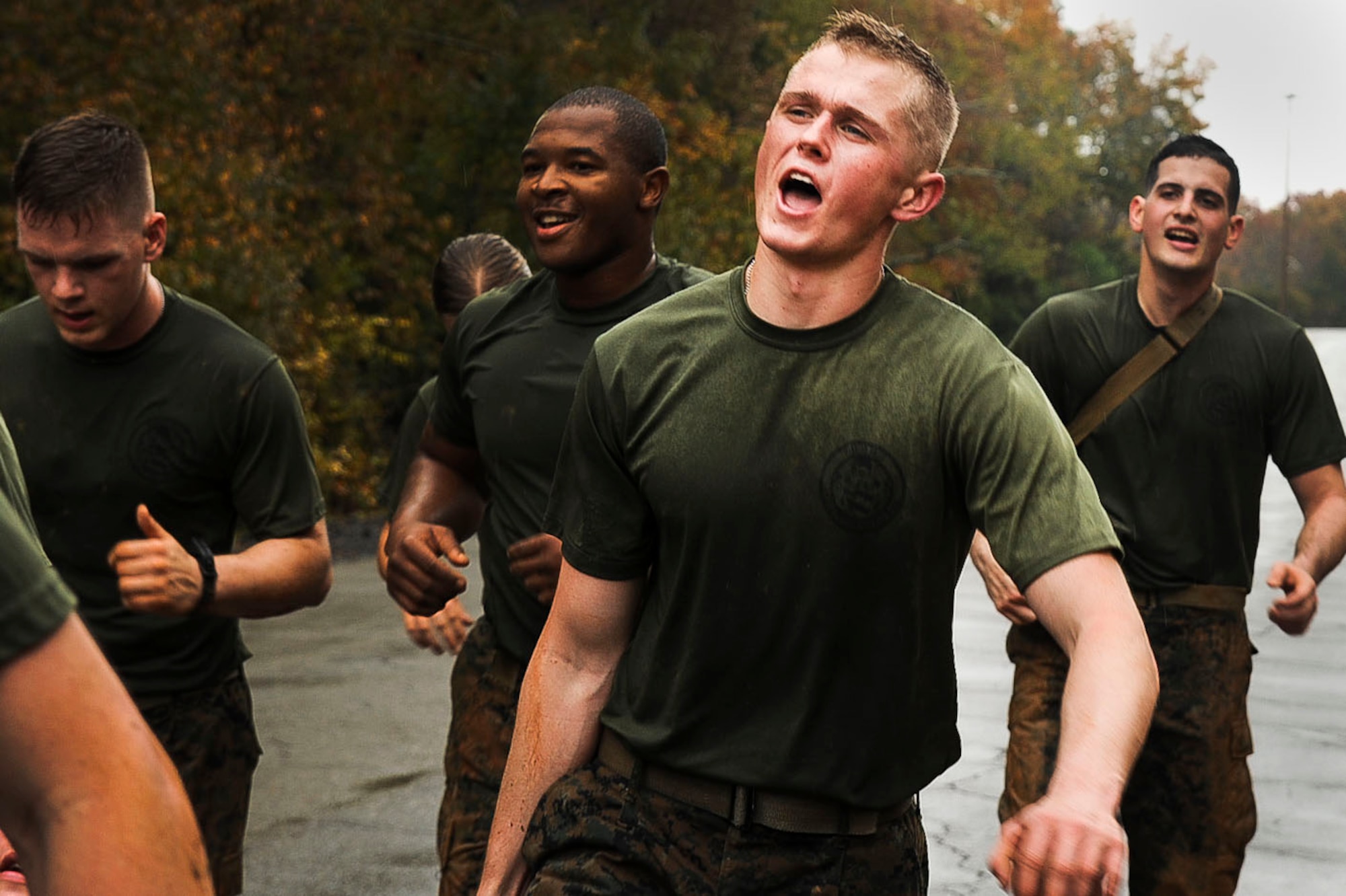 Marines from the Center for Naval Aviation Technician Training detachment at Little Rock Air Force Base, Ark. remembered the sacrifices of fallen comrades with a logistics run, Nov. 6, 2013. The three mile run featured simulated combat scenarios focused on practicing war time skills. Participants performed litter transport and ammo can carries as they trekked to locations dedicated to fallen Marines. As detachment members stopped at each location, a citation was read of a Medal of Honor recipient and the formation dropped for push-ups as a physical reminder of the sacrifices of fallen Marines. (U.S. Air Force photo by Senior Airman Kaylee Clark)