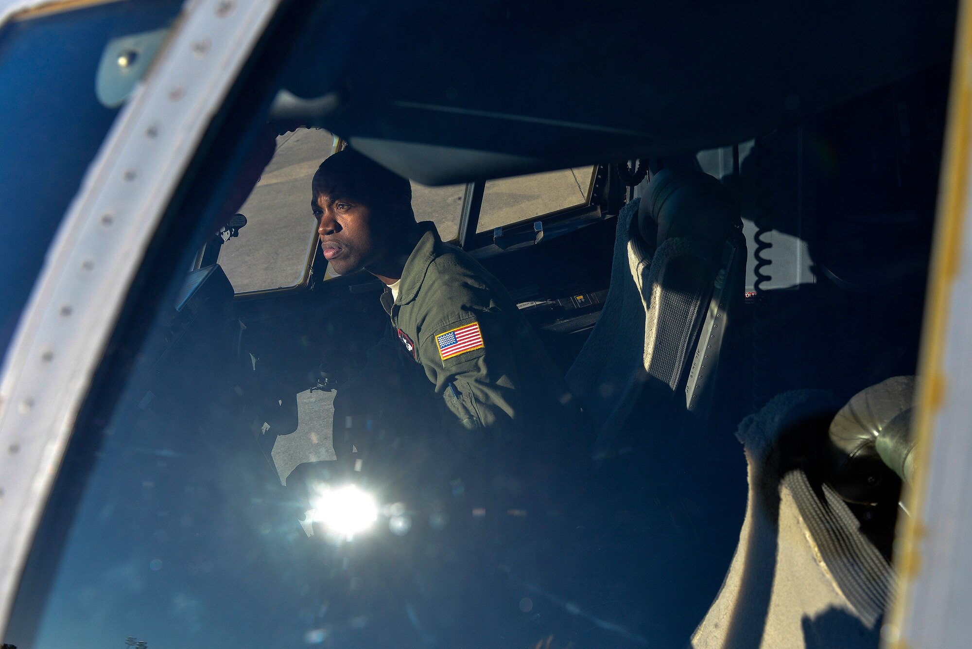 Staff Sgt. Maxwell Jones, a 41st Airlift Squadron loadmaster, performs a pre-flight power-up on a C-130J Nov. 12, 2013, at Little Rock Air Force Base, Ark. The power-up allows Jones, a Norfolk, Va. native, to inspect the vital aircraft systems loadmasters are responsible for during flight. (U.S. Air Force photo by Staff Sgt. Russ Scalf)