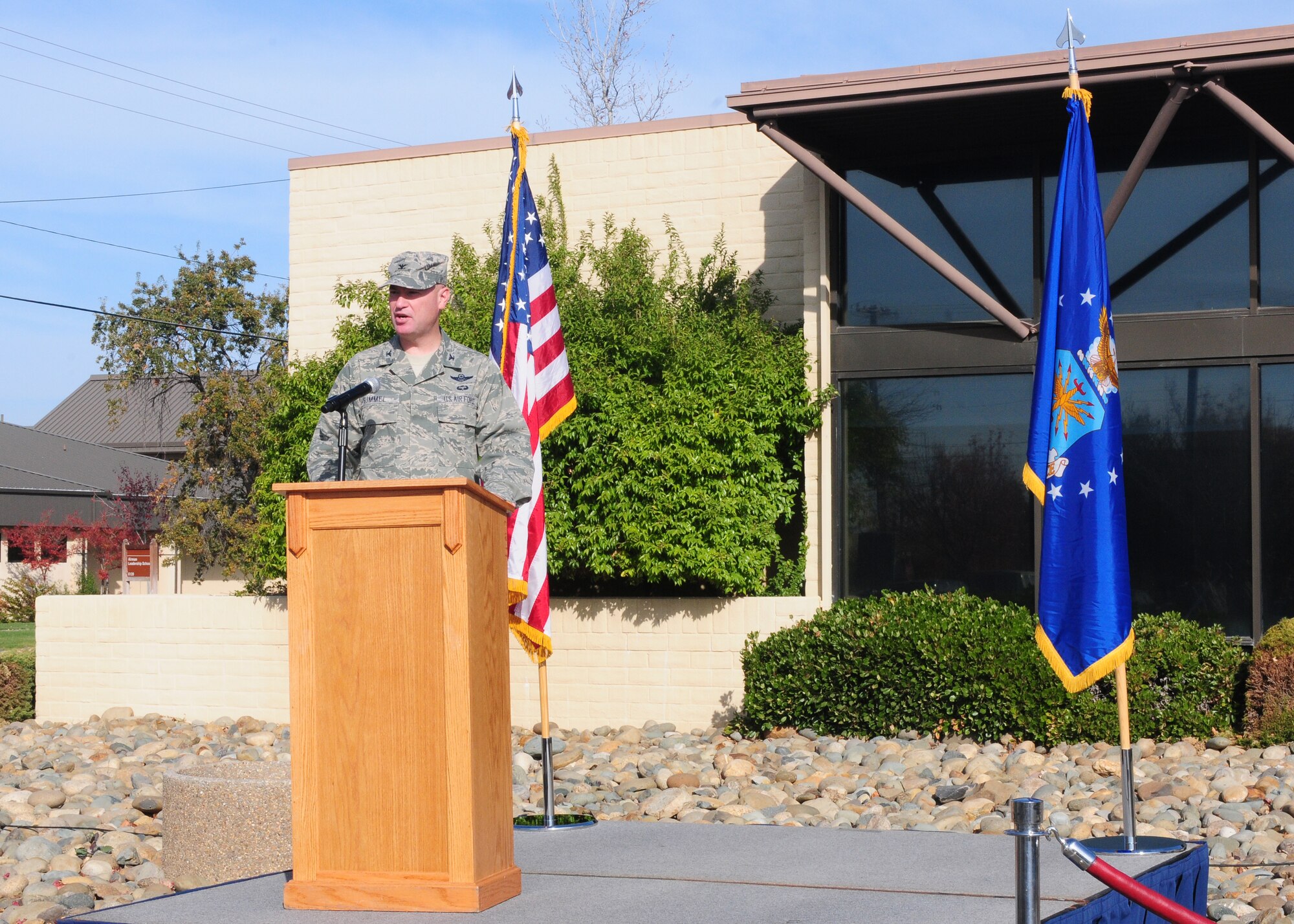 Col. Quinn Gummel, 9th Reconnaissance Wing vice commander, speaks to Team Beale during the Contrails Dining Facility grand reopening ribbon cutting ceremony at Beale Air Force Base, Calif., Nov. 14, 2013. Contrails will now be open to all military, dependents, retirees, civilians and contractors. (U.S. Air Force photo by Senior Airman Allen Pollard/Released)