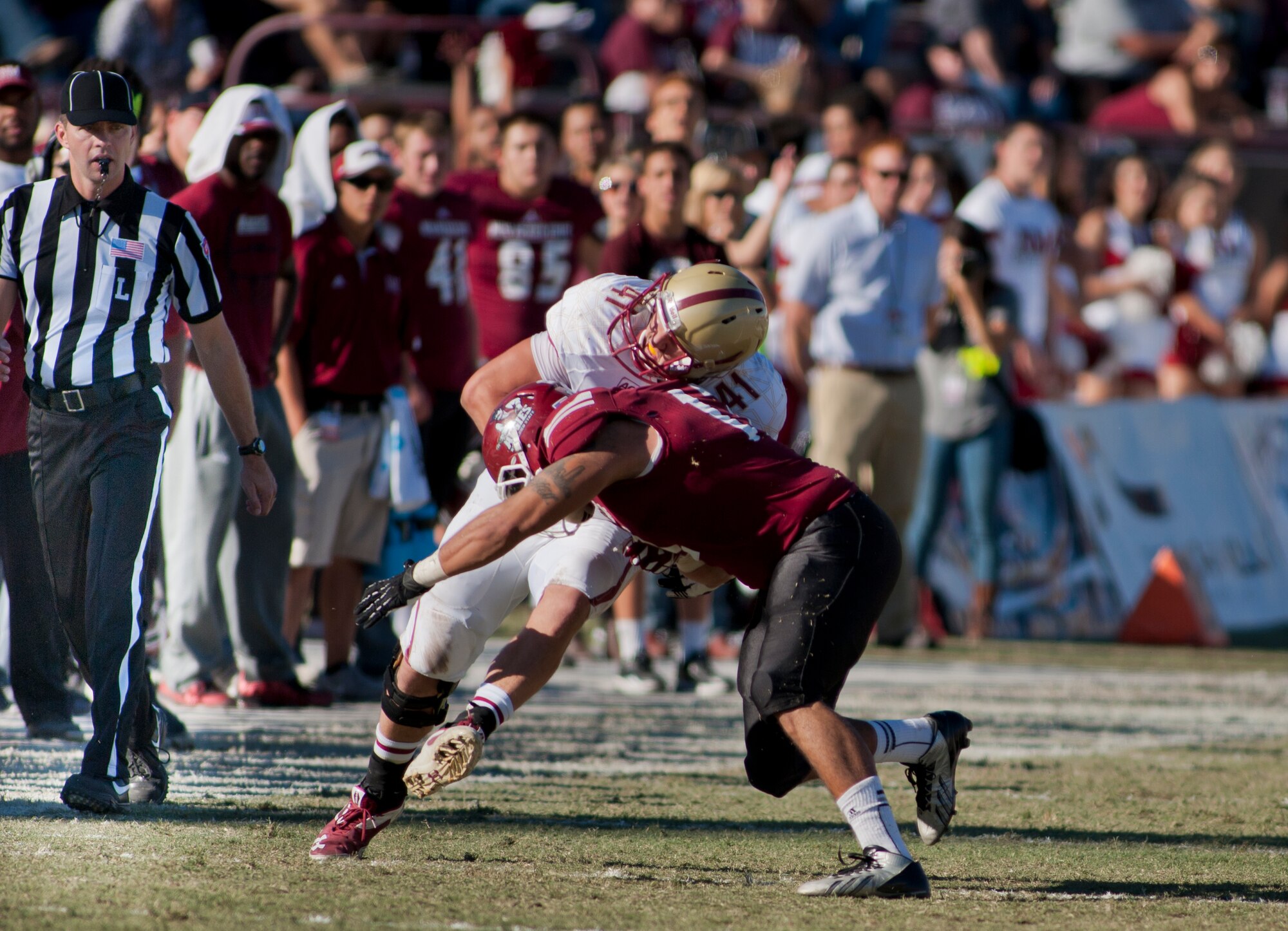 The New Mexico State University football team squares off against Boston College during their annual military appreciation game, which honored current and past military veterans at Aggie Memorial Stadium in Las Cruces, N.M., Nov. 9. The NMSU athletic director presented several awards to military members who attended the game. (U.S. Air Force photo by Airman 1st Class Aaron Montoya/Released)