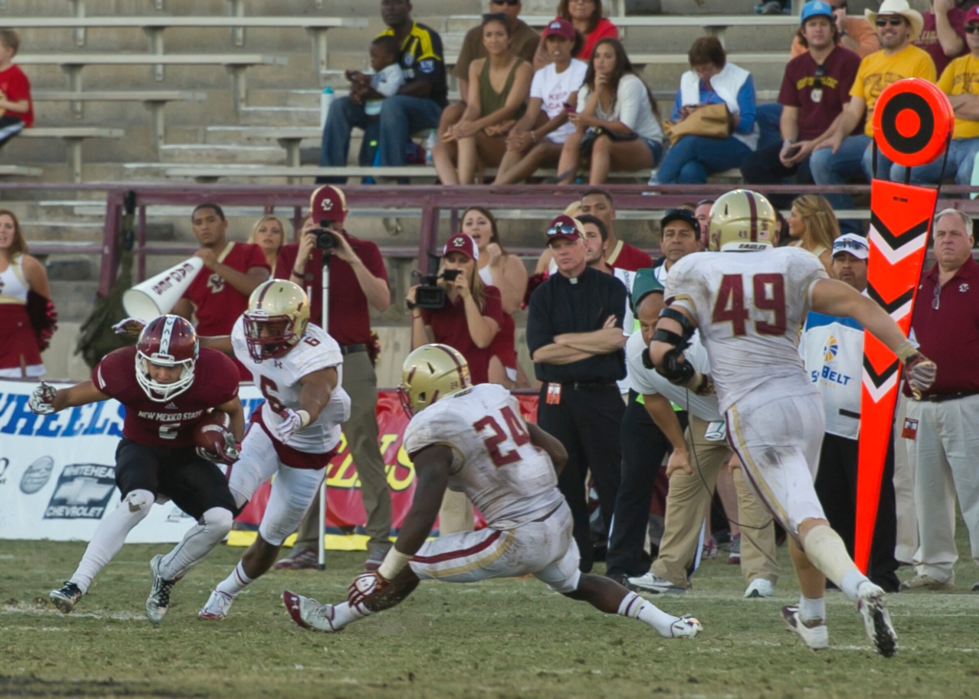 The New Mexico State University football team squares off against Boston College during their annual military appreciation game, which honored current and past military veterans at Aggie Memorial Stadium in Las Cruces, N.M., Nov. 9. The NMSU athletic director presented several awards to military members who attended the game. (U.S. Air Force photo by Airman 1st Class Aaron Montoya/Released)