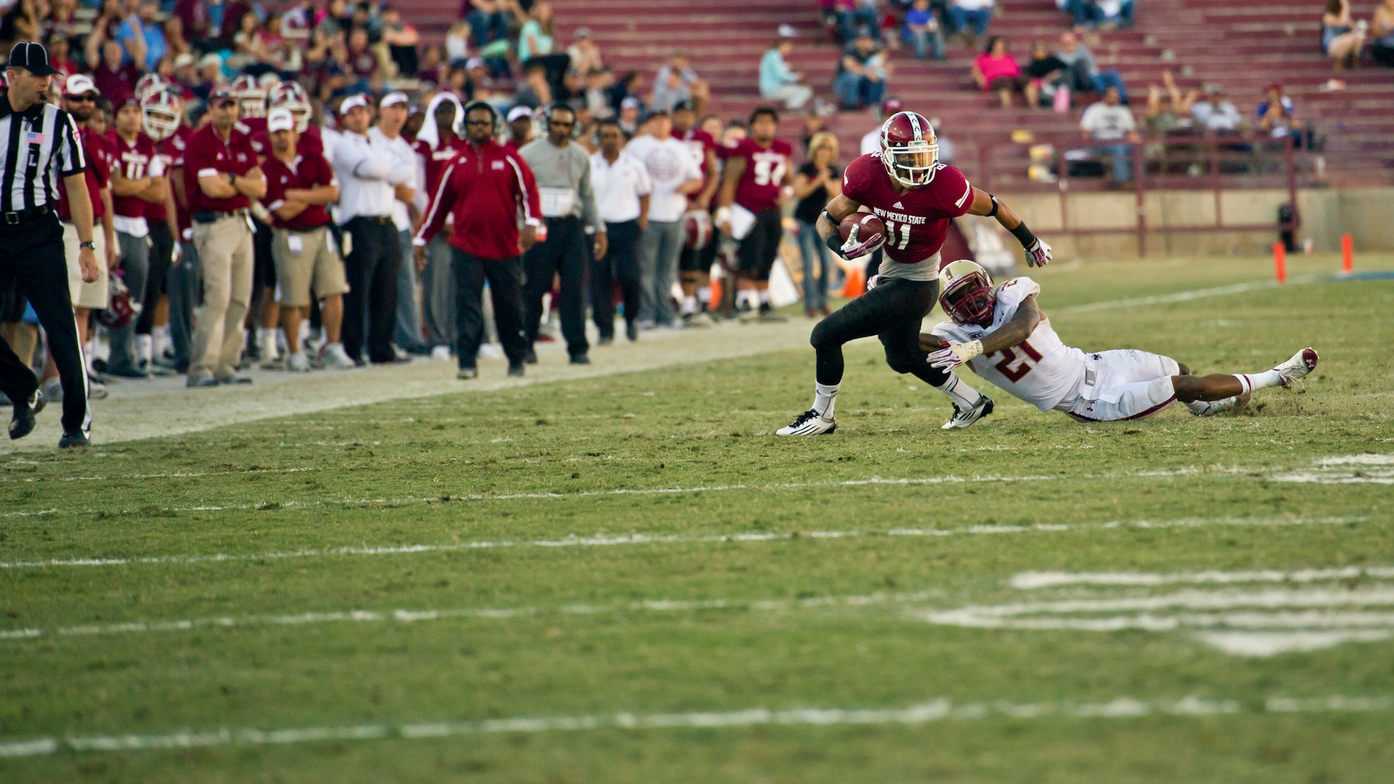 The New Mexico State University football team squares off against Boston College during their annual military appreciation game, which honored current and past military veterans at Aggie Memorial Stadium in Las Cruces, N.M., Nov. 9. The NMSU athletic director presented several awards to military members who attended the game. (U.S. Air Force photo by Airman 1st Class Aaron Montoya/Released)