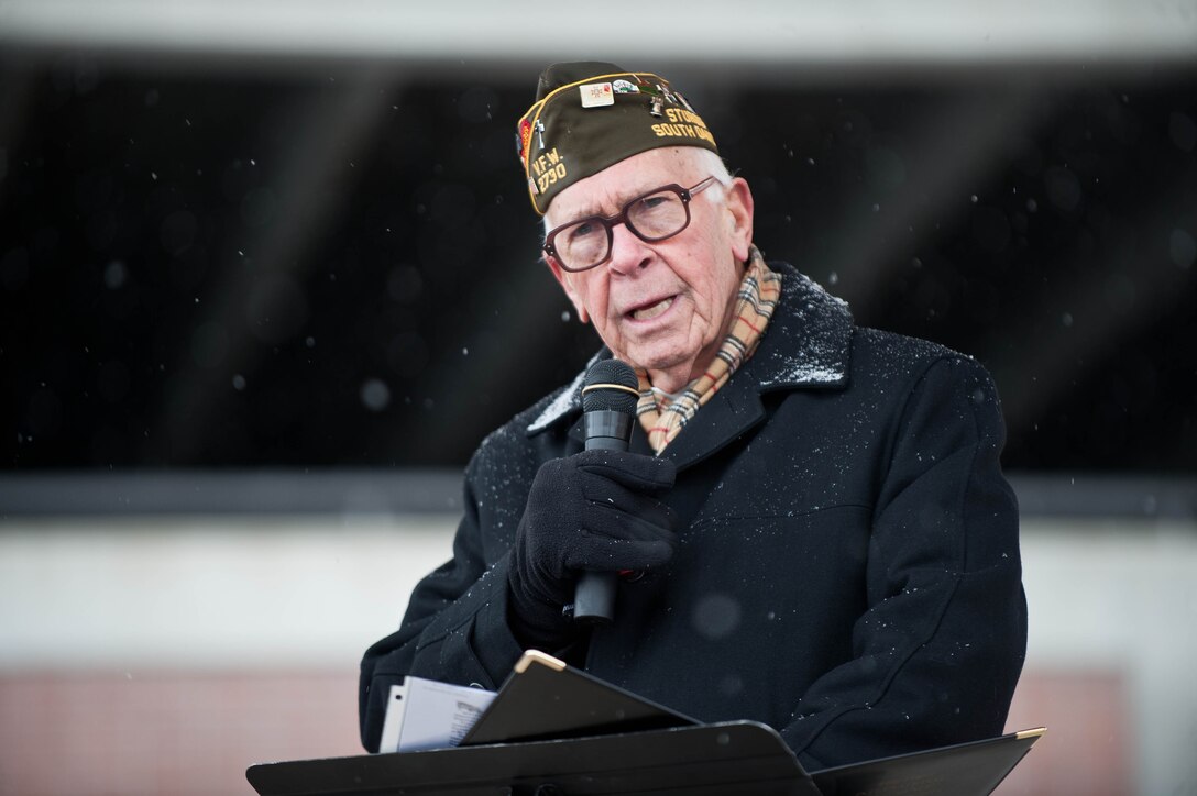 Pastor Herb Cleveland, Army veteran and former National Veteran Affairs chaplain, speaks to attendees of the Veterans Day parade in Rapid City, S.D., Nov. 11, 2013. Military members, their families and area residents joined base and local leaders to pay homage to all veterans – past and present. (U.S. Air Force photo by Senior Airman Zachary Hada/Released)
