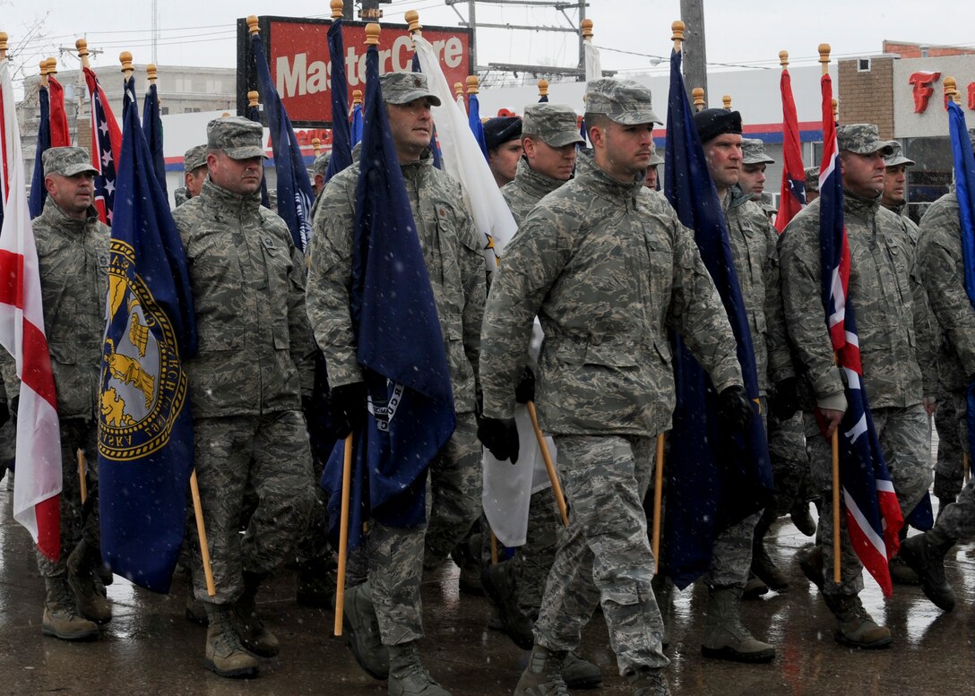 Airmen from Ellsworth Air Force Base march down Main Street during a Veterans Day parade in Rapid City, S.D., Nov. 11, 2013. Originally known as Armistice Day, Veterans Day was established in 1954 and symbolizes the sacrifice and service of our nation’s veterans. (U.S. Air Force photo by Senior Airman Anania Tekurio/Released)