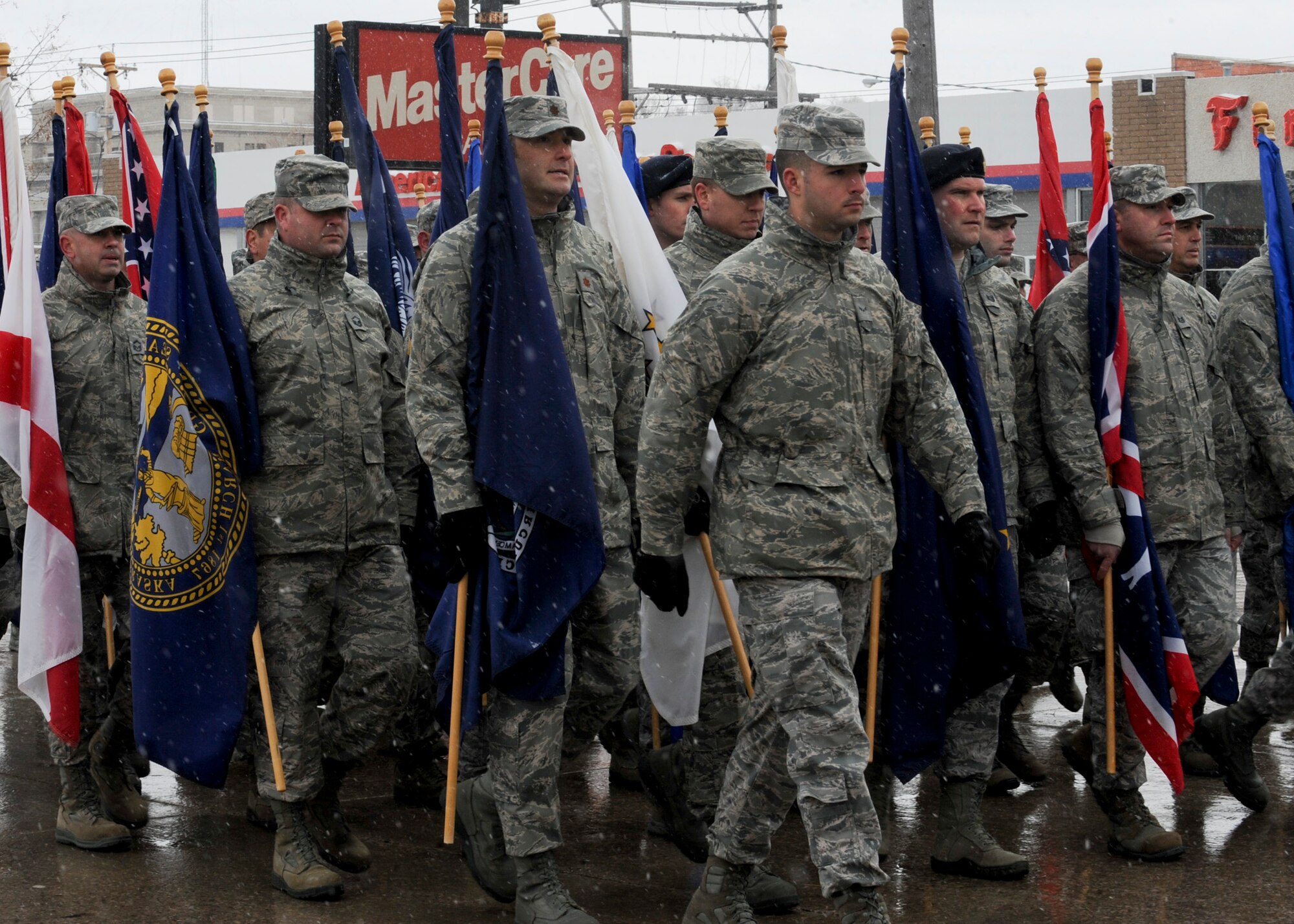 Airmen from Ellsworth Air Force Base march down Main Street during a Veterans Day parade in Rapid City, S.D., Nov. 11, 2013. Originally known as Armistice Day, Veterans Day was established in 1954 and symbolizes the sacrifice and service of our nation’s veterans. (U.S. Air Force photo by Senior Airman Anania Tekurio/Released)