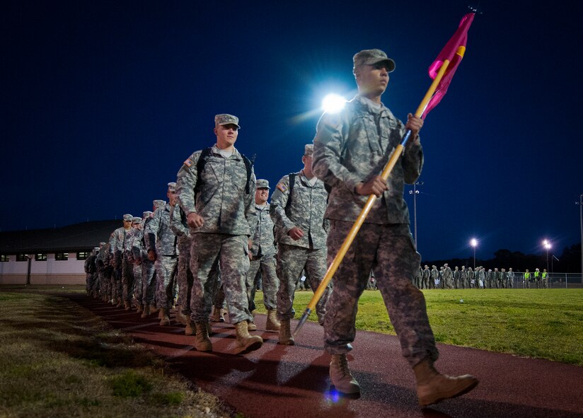 Soldiers from the Army Detachment of the Naval School Explosive Ordnance Disposal march in formation to the Airman’s Attic to drop off toys for Eglin’s annual holiday toy drive Nov. 13.  More than 300 Soldiers participated in the march.  The toy giveaway is Nov. 23 from 8 a.m. to 3 p.m. at Bldg. 615.  The giveaway is open to servicemembers E-6 and below.  Donation will be accepted through Nov. 21.  (U.S. Air Force photo/Samuel King Jr.)