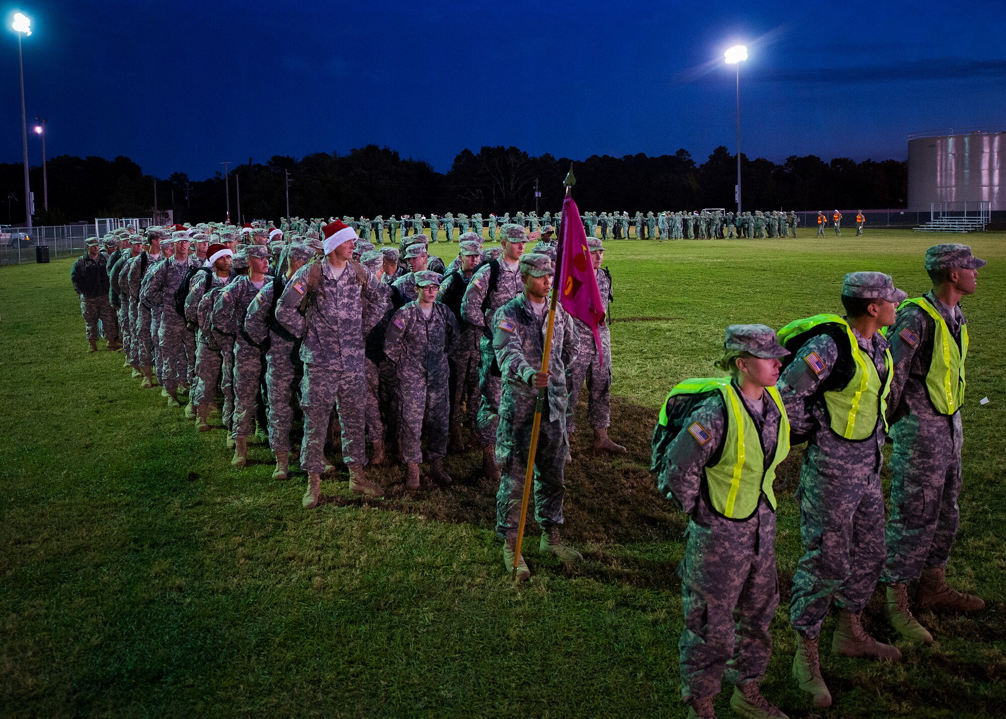 Soldiers from the Army Detachment of the Naval School Explosive Ordnance Disposal stand in formation prior to marching to the Airman’s Attic to drop off toys for Eglin’s annual holiday toy drive Nov. 13.  More than 300 Soldiers participated in the march. The toy giveaway is Nov. 23 from 8 a.m. to 3 p.m. at Bldg. 615.  The giveaway is open to servicemembers E-6 and below.  Donation will be accepted through Nov. 21.  (U.S. Air Force photo/Samuel King Jr.)