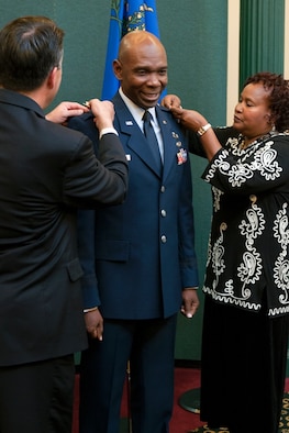 Ondra Berry, center, receives his stars marking his promotion to brigadier general from Gov. Brian Sandoval and his wife Margo Berry during a ceremony in the Guinn Room at the Nevada Capitol on Nov.12. Berry is the first African-American general in the Nevada Guard and is now the Nevada Air Guard’s assistant adjutant general.
Photo by Staff Sgt. Mike Getten, Joint Force Headquarters Public Affairs
