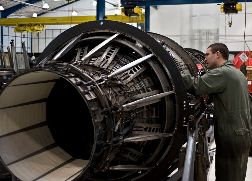 U.S. Air Force Senior Airman Chase Ferrell, 7th Component Maintenance Squadron, closely inspects the outer components of a General Electric F101-102 turbofan jet engine from a B-1B Lancer, Nov. 13, 2013, at Dyess Air Force Base, Texas. Inspections like this are very important to ensure each component will operate safely and correctly prior to returning the engine to service. (U.S. Air Force photo by Staff Sgt. Richard Ebensberger/Released)