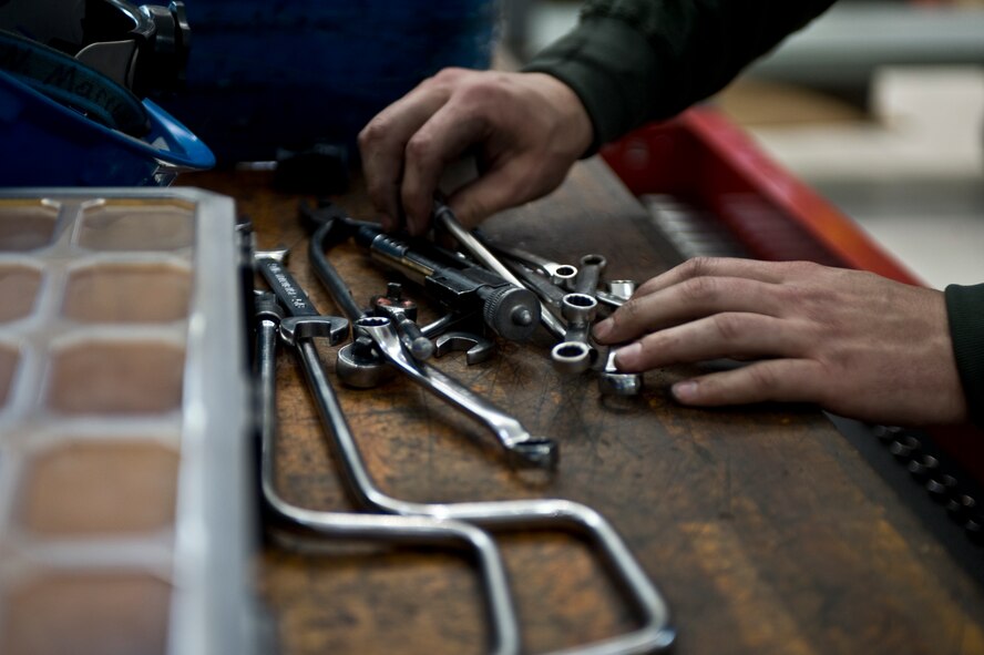 U.S. Air Force Senior Airman Nichola Morrone, 7th Component Maintenance Squadron, re-organizes his tools after completing a disassembly of a General Electric F101-102 turbofan jet engine from a B-1B Lancer, Nov. 13, 2013, at Dyess Air Force Base, Texas. Before and after every job Aerospace Propulsion technicians must inventory their composite tool kits to ensure accountability. A lost tool could potentially cause severe damage to an engine. (U.S. Air Force photo by Staff Sgt. Richard Ebensberger/Released)