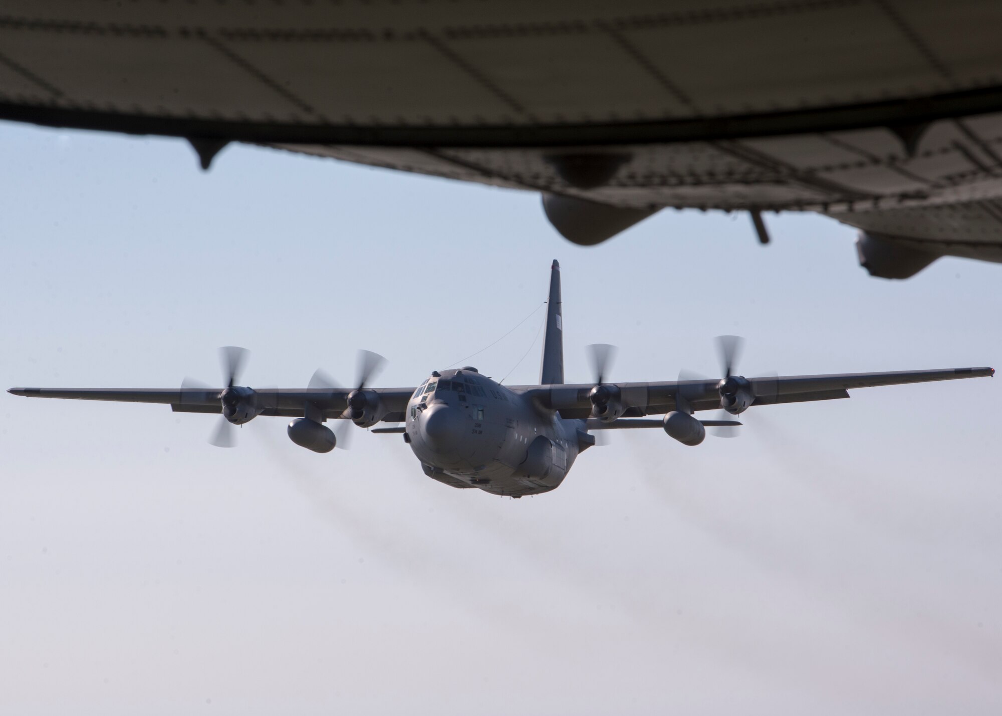 An U.S. C-130 Hercules flies over Bangladesh, Nov. 10, 2013. The aircraft performed airlift missions during exercise Cope South. (U.S. Air Force photo by Captain Raymond Geoffroy/Released)