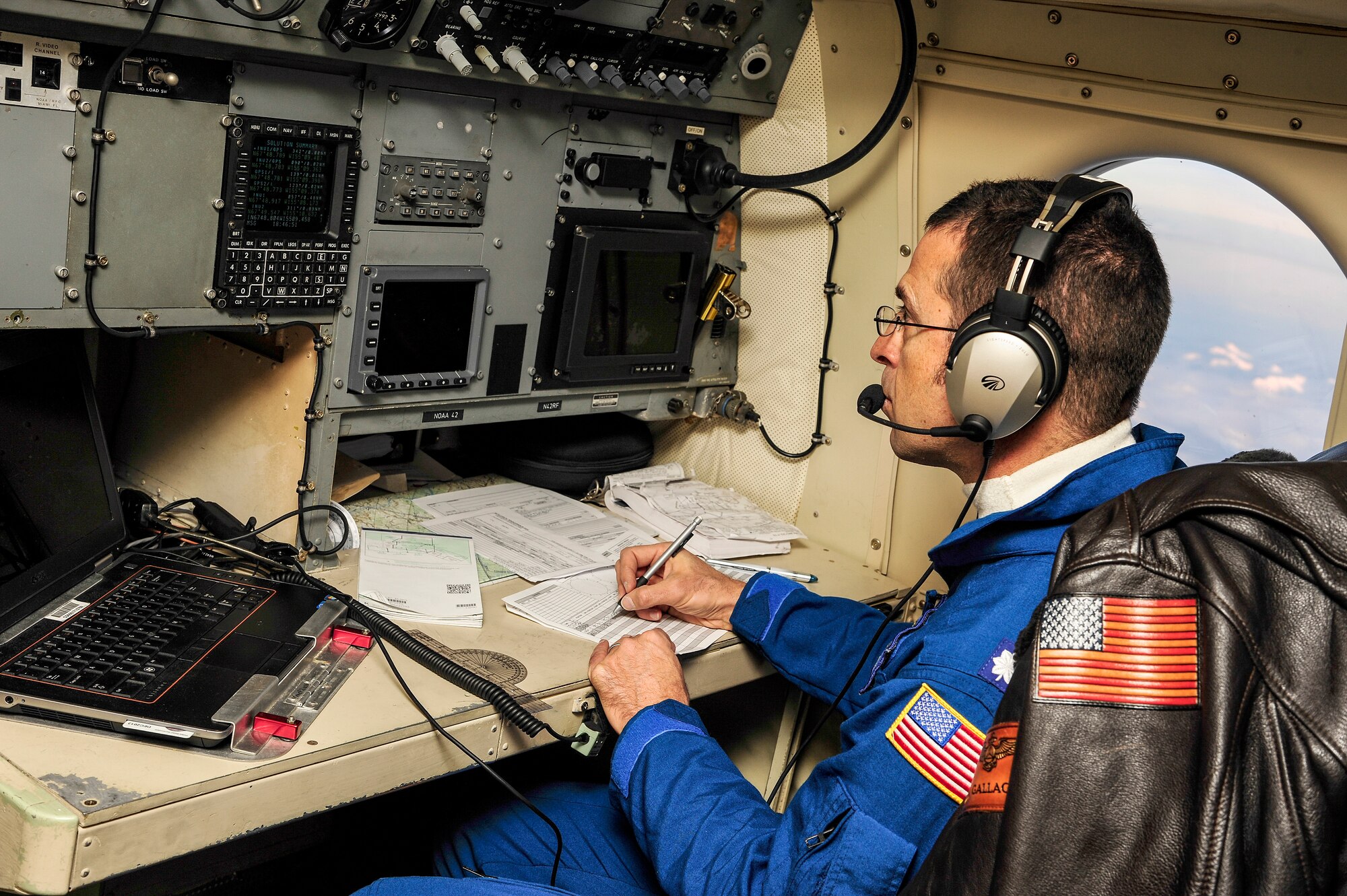 Cmdr. Tim Gallagher, National Oceanic and Atmospheric Administration WP-3D Orion navigator, tracks the location of the aircraft during a flight over the fringes of the Arctic Ocean Oct. 30, 2013. NOAA’s mission aimed to look at the effect of anomalous heat over the Chukchi and Beaufort Seas and its effect on the overlying atmosphere. (U.S. Air Force photo by Senior Airman Zachary Perras/Released)