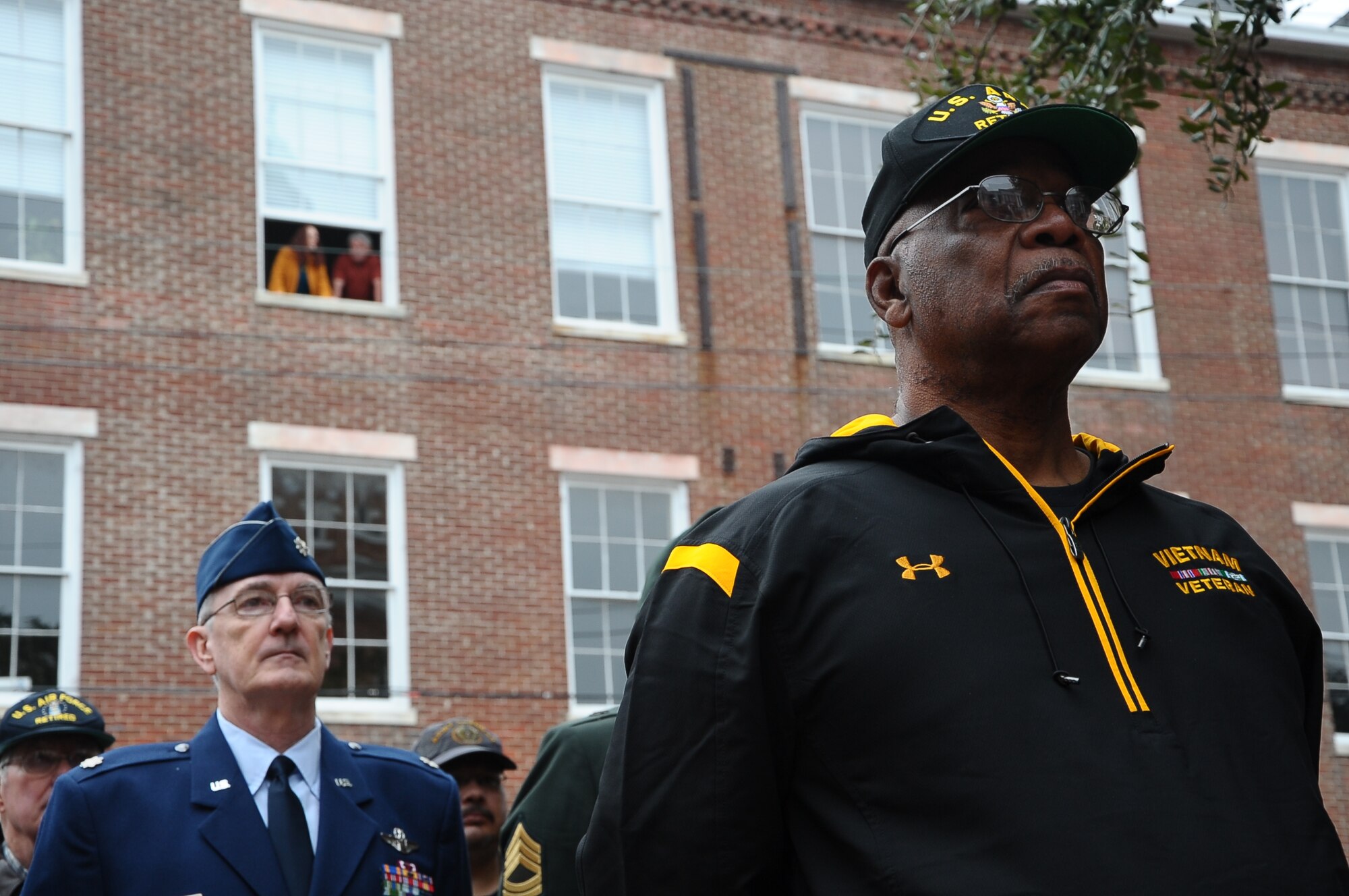Veterans, retired or still serving, stand at parade rest during the wreath laying ceremony at the Lowndes County Courthouse Nov. 9. (U.S. Air Force Photo/Airman Daniel Lile)