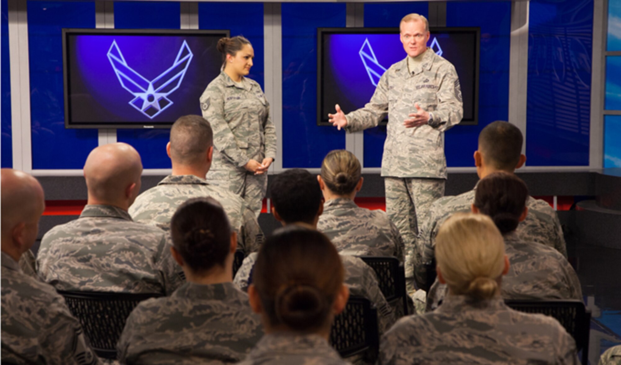 Chief Master Sergeant of the Air Force James A. Cody (right) answers a question from the audience during a worldwide CHIEFchat, on Nov. 12, 2013, at the Defense Media Activity at Fort George G. Meade, Md. Airmen around the world had the opportunity to submit their questions to the service's top enlisted leader through social media and video submissions. (U.S. Air Force photo/Master Sgt. Lee Hoover)