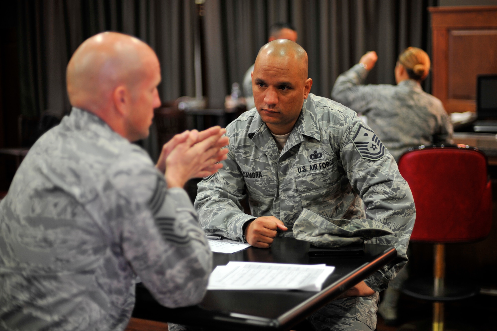 Chief Master Sgt. Michael Hullender, 51st Logistics Readiness Squadron vehicle fleet manager, mentors Master Sgt. Bradford Cambra, 51st Communications Squadron first sergeant, during the first Leadership GPS speed mentoring session at Osan Air Base, Republic of Korea, Nov. 13, 2013. The Osan Chiefs Group and Top III Council are now ensuring all enlisted ranks are properly mentored to help Airmen vector their career path. (U.S. Air Force photo/Staff Sgt. Emerson Nuñez)
