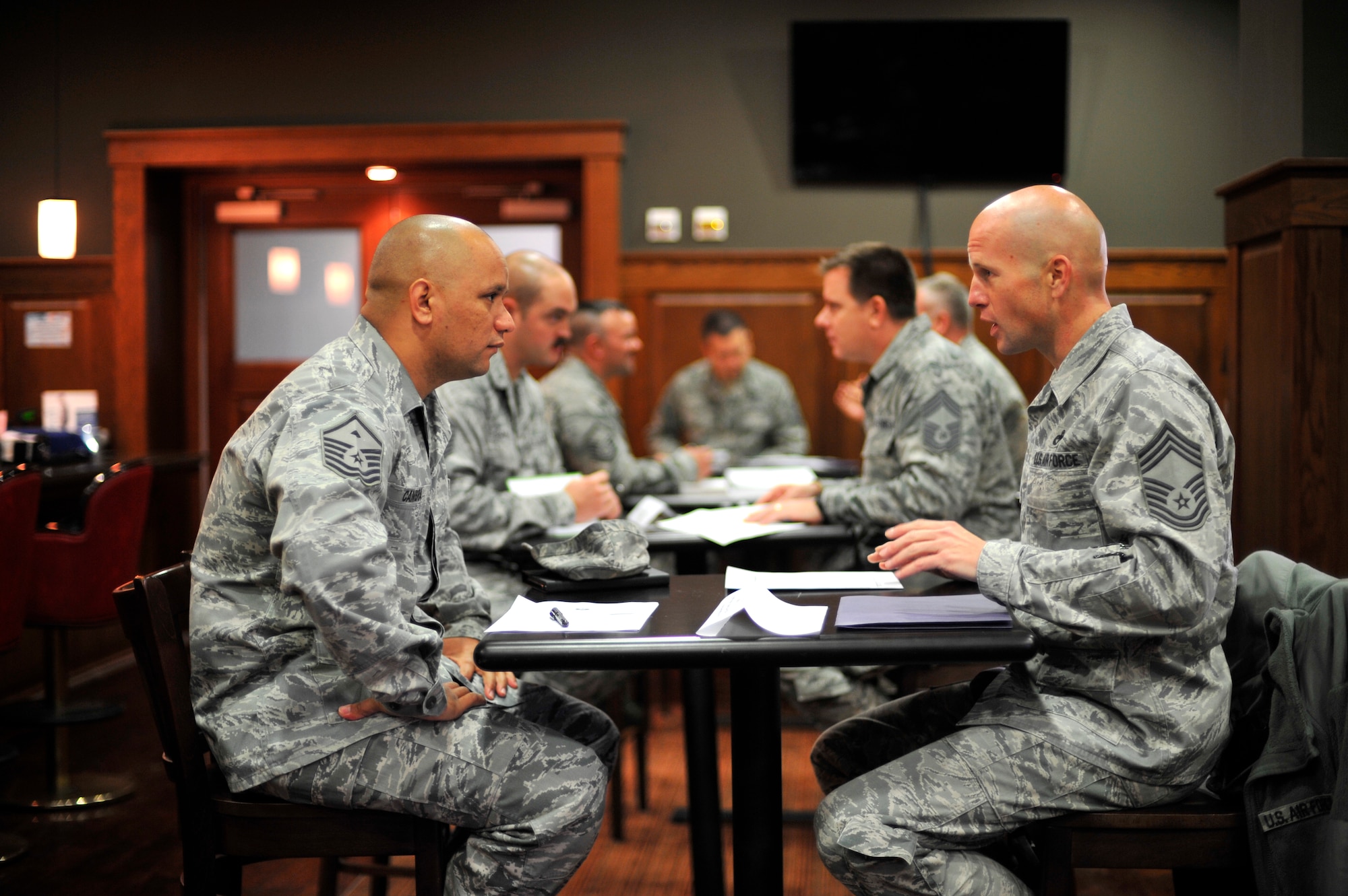 Chief Master Sgt. Michael Hullender, 51st Logistics Readiness Squadron vehicle fleet manager, mentors Master Sgt. Bradford Cambra, 51st Communications Squadron first sergeant, during the first Leadership GPS speed mentoring session at Osan Air Base, Republic of Korea, Nov. 13, 2013. Before the event, each chief reviewed three career packages and gave a “progress report” to three senior NCOs to help them develop professionally among the enlisted corps. (U.S. Air Force photo/Staff Sgt. Emerson Nuñez)