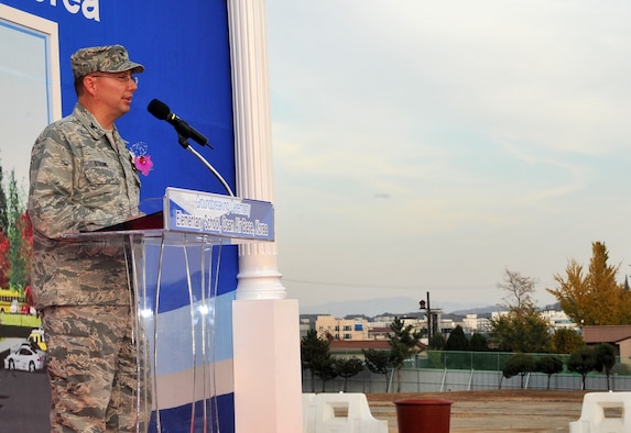 Col. Michael Strunk, 51st Mission Support Group commander, addresses those gathered to celebrate the groundbreaking for the new elementary school during a ceremony at Osan Air Base, Republic of Korea, Nov. 13, 2013. The school will feature a computer lab and art and learning impaired rooms, as well as solar heating. (U.S. Air Force photo/Airman 1st Class Ashley J. Thum)