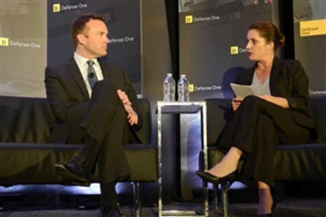 Acting Air Force Secretary Eric Fanning responds to Stephanie Gaskell, associate editor and senior reporter for Defense One, during the inaugural Defense One Summit in Washington, D.C., Nov. 14, 2013.  The summit brought more than 400 members of the national security community and media together to discuss the future of the defense landscape.  
