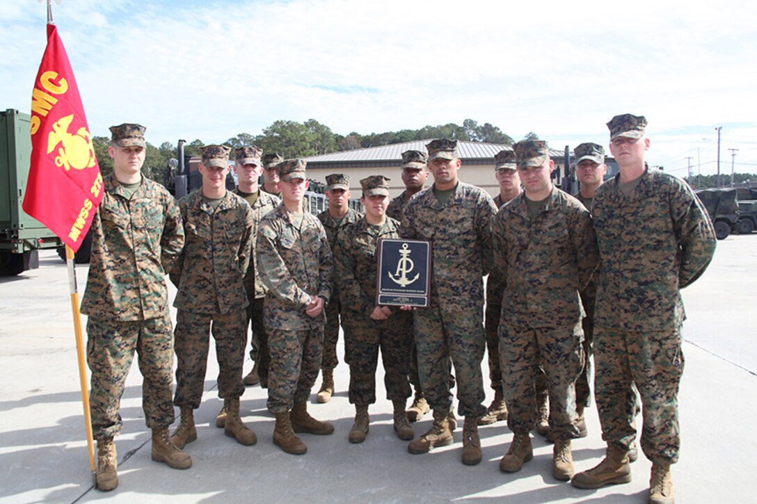 The Marines of the Marine Wing Support Squadron 273 Engineer Company proudly stand together after receiving the Engineer Company of the Year award from Lt. Col. James Stone, the commanding officer of MWSS-273, aboard Marine Corps Air Station Beaufort, Nov. 7.