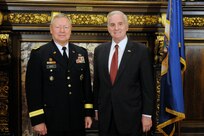 Chief of the National Guard Bureau Gen. Frank J. Grass met with Minnesota Gov. Mark Dayton, Oct. 17, 2013, at the Governor’s Office in St. Paul, Minn., to discuss National Guard challenges, priorities and objectives.