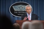 Defense Secretary Chuck Hagel talks about the government shutdown during a news conference at the Pentagon, Oct. 17, 2013.