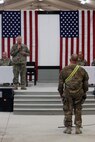 Gen. Frank Grass answers a question asked by a Guard member during a town hall at Kandahar Airfield, Afghanistan, Nov. 7, 2013. Grass visited KAF to meet with deployed Guard members and Regional Command (South) leadership.