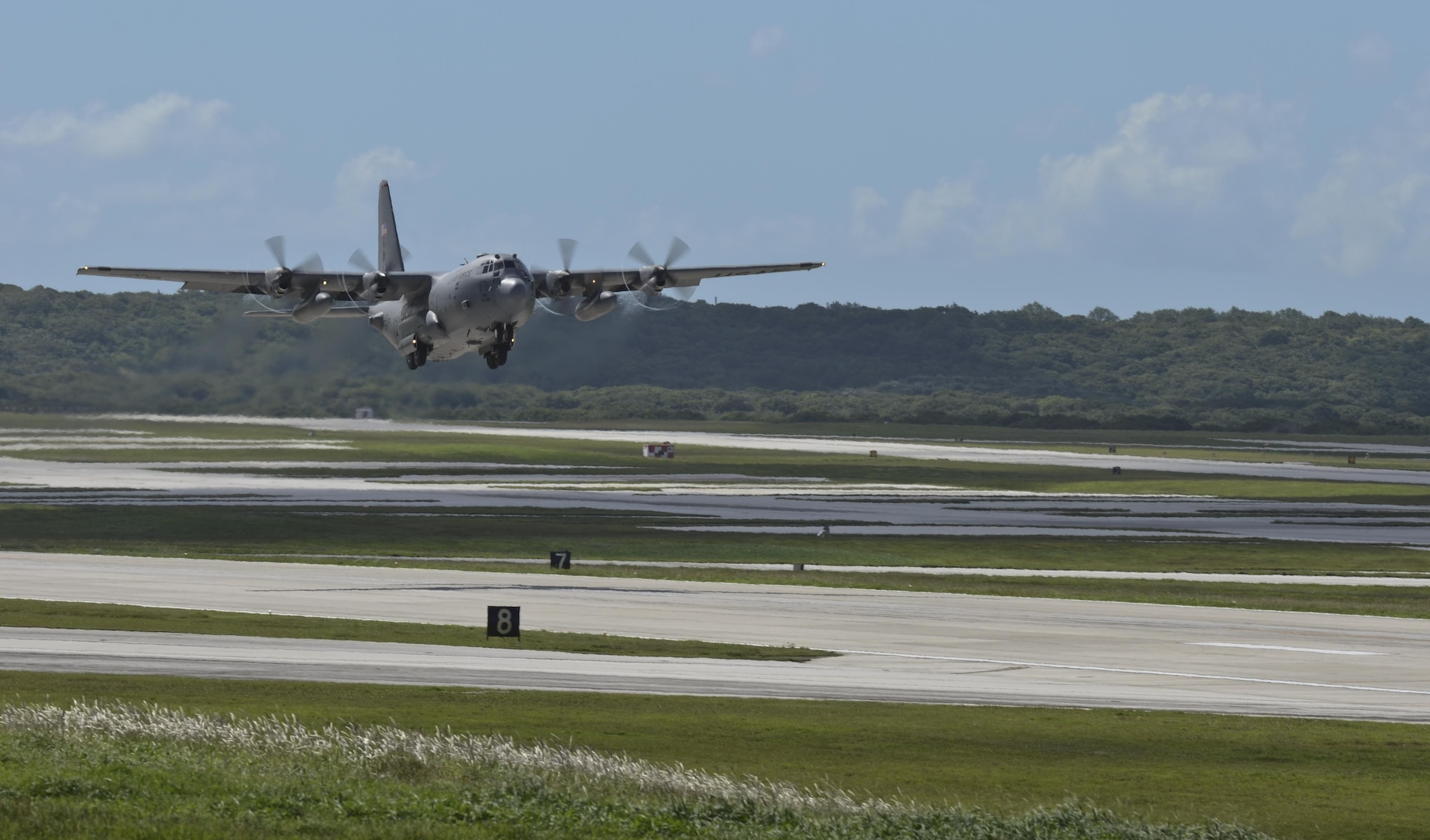 A C-130 Hercules takes off transporting Airmen and equipment in support of Operation Damayan Nov. 14, 2013, from Andersen Air Force Base, Guam. Pacific Air Forces sent a C-130 from 374th Airlift Wing, Yokota Air Base, Japan, with a 12-member assessment team from the 36th Contingency Response Group. The assessment team will determine if the Tacloban airfield is able to receive follow on aircraft, particularly, C-17 Globemaster IIIs. 