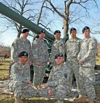 Some of the New York Army National Guard Soldiers chosen to compete in the South African National Defense Force 2011 Regional Combat Rifle Competition pose at Watervliet Arsenal after fulfilling requirements for the trip. Standing, Staff Sgt. Dennis Rick, Sgt. Maj. Anthony Coluccio, Sgt. 1st Class Arthur Evans, an alternate, Spc. Matthew Melendez and Cpl. Jonathan Patton. Kneeling, Spc. Masami Yamakado and Spc. Jason Grossman. Other Soldiers who are part of the team were not available for the photograph.