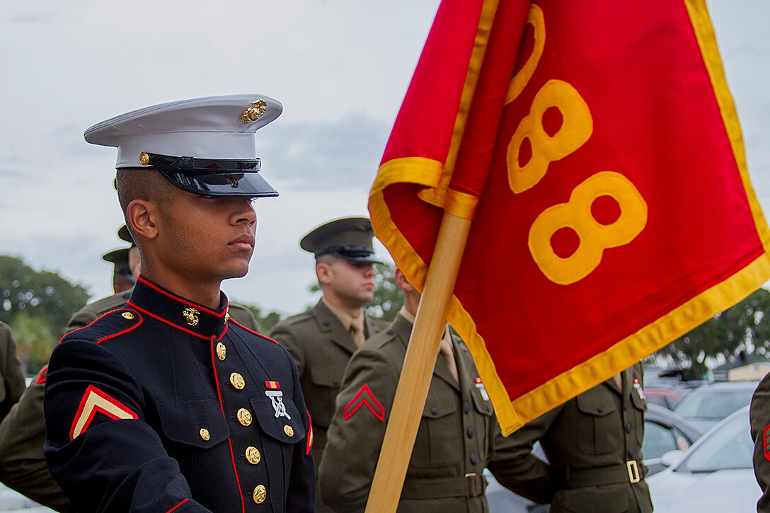 Pfc. Krystian Sylvester, honor graduate for platoon 2088, stands at parade rest before graduation starts aboard Parris Island, S.C., Nov. 15, 2013. Sylvester, a native of Covington, Ga., was recruited Sgt. Michael A. Brown, recruiter from Recruiting Substation Canton, Recruiting Station Atlanta. Sylvester will be able to enjoy some much deserved leave with his family as he prepares for Marine combat training in Camp Geiger, N.C. (U.S. Marine Corps photo by Lance Cpl. John-Paul Imbody)