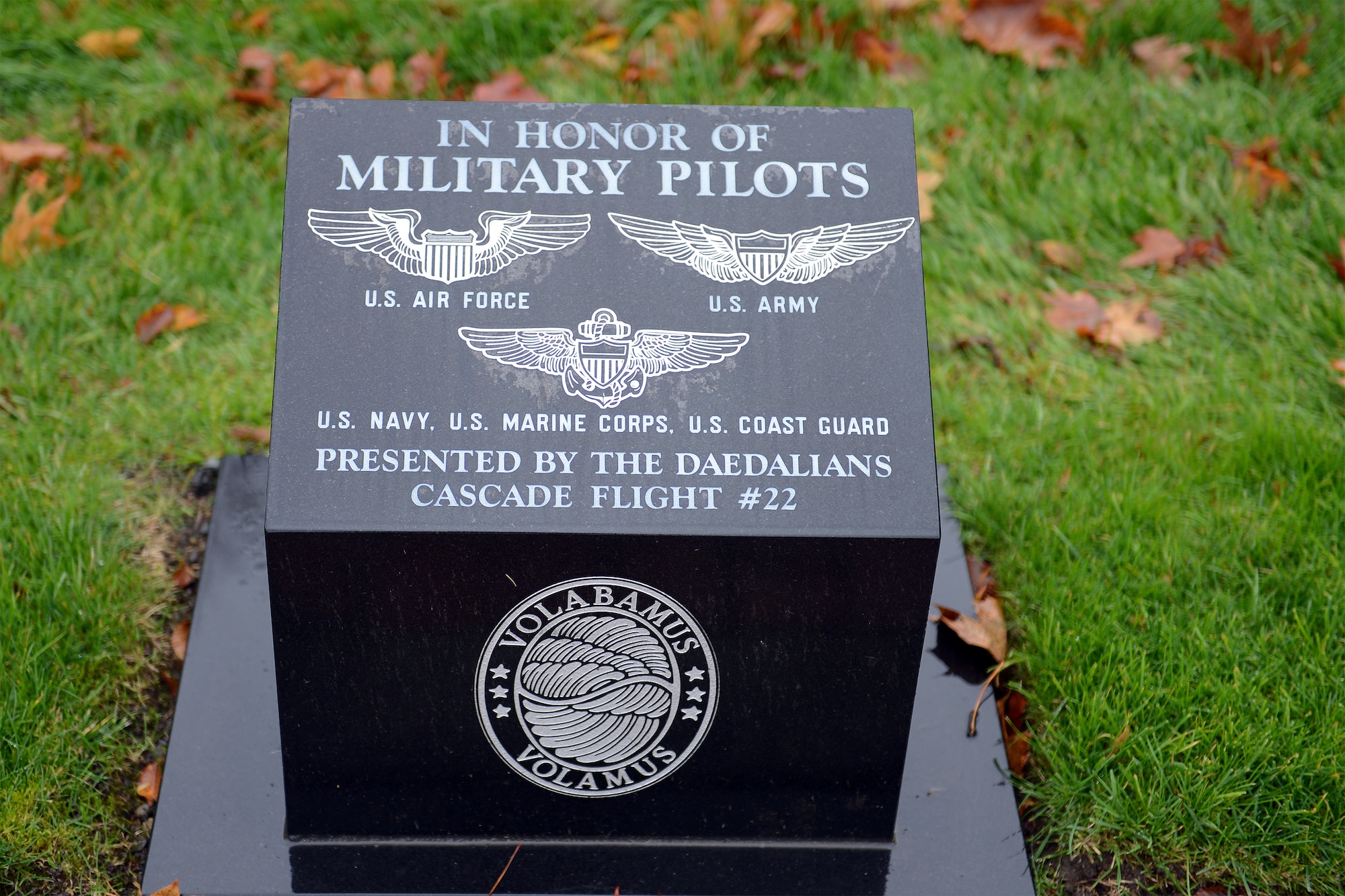 A plaque presented by the Daedalians Cascade Flight number 22 sits in Memorial Grove Park, Nov. 15, 2013, at Joint Base Lewis-McChord, Wash. A fraternity and order of pilots representing past and present military aviators, the Deadalians are dedicated to honoring and paying tribute to the sacrifice and service of all past and present military pilots. (U.S. Air Force photo/Airman 1st Class Jacob Jimenez)