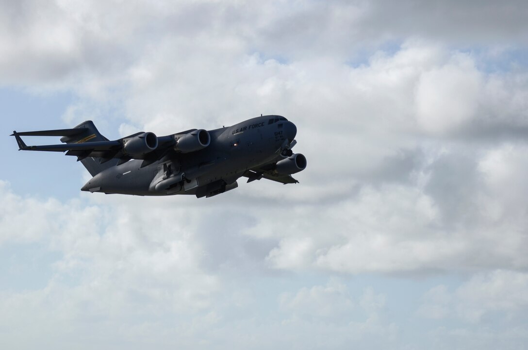 A C-17 Globemaster III takes off from the Andersen Air Force Base, Guam, flightline to support Operation Damayan in Tacloban, Philippines. Operation Damayan is a U.S. humanitarian aid and disaster relief effort to support the Philippines in the wake of the devastating effects of Typhoon Haiyan. (U.S. Air Force photo by Senior Airman Marianique Santos/Released)