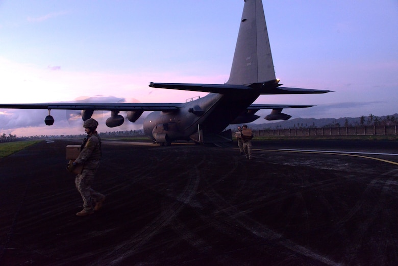 Airmen from the 353rd Special Operations Group offload equipment from an MC-130H Combat Talon II Nov. 15, 2013 at Ormoc Airport, Philippines. The Airmen, deployed in support of Operation Damayan, are assisting the Armed Forces of the Philippines and U.S. Marine Corps Forces Pacific as they provide aid in the aftermath of Typhoon Haiyan. (U.S. Air Force photo by Tech. Sgt. Kristine Dreyer)