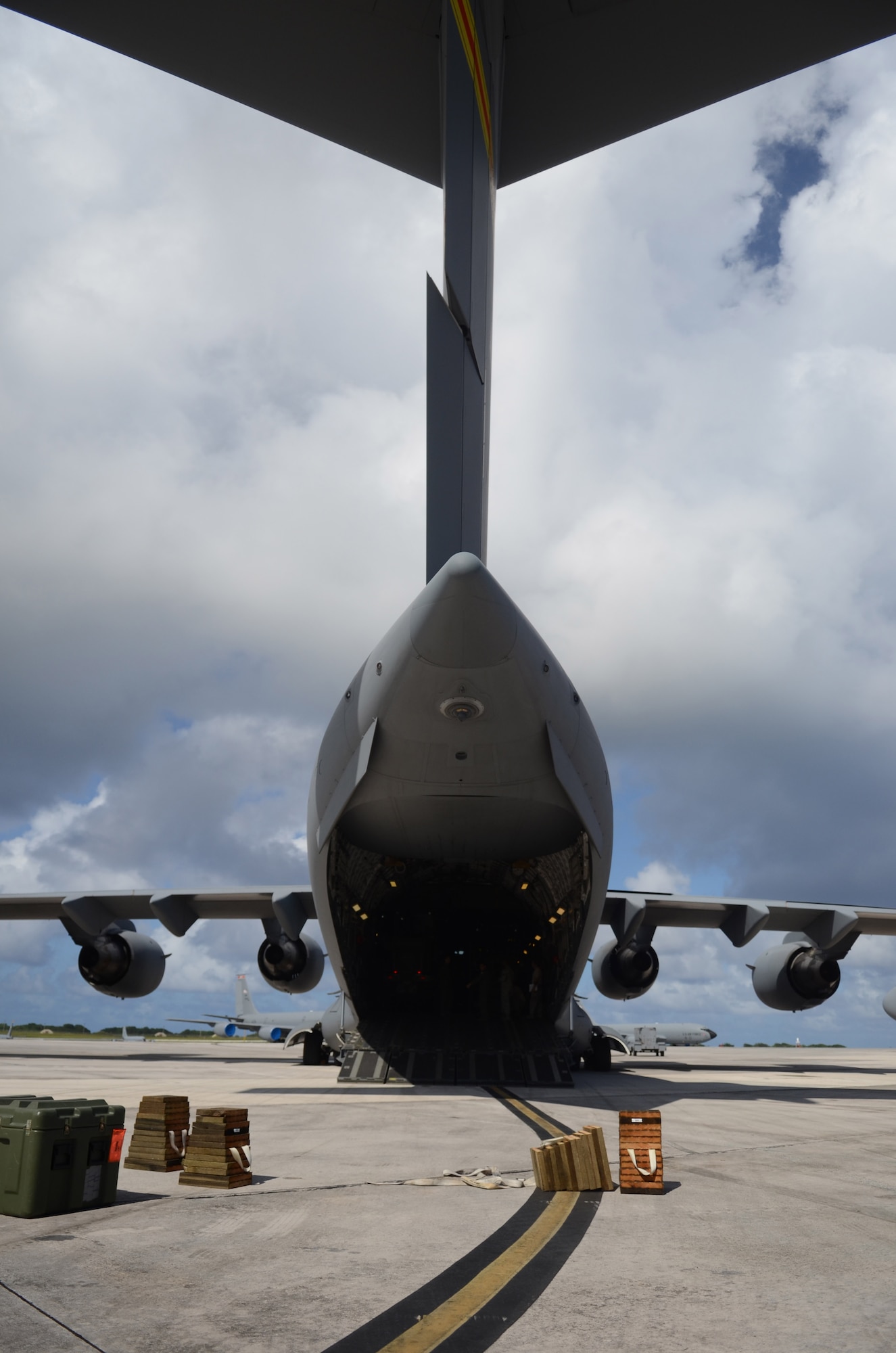 A C-17 Globemaster III is parked Nov. 15, 2013, on the Andersen Air Force Base, Guam, flightline, before departing to transport Airmen and equipment to support Operation Damayan in Tacloban, Philippines. Operation Damayan is a U.S. humanitarian aid and disaster relief effort to support the Philippines in the wake of the devastating effects of Typhoon Haiyan. (U.S. Air Force photo by Senior Airman Marianique Santos/Released)