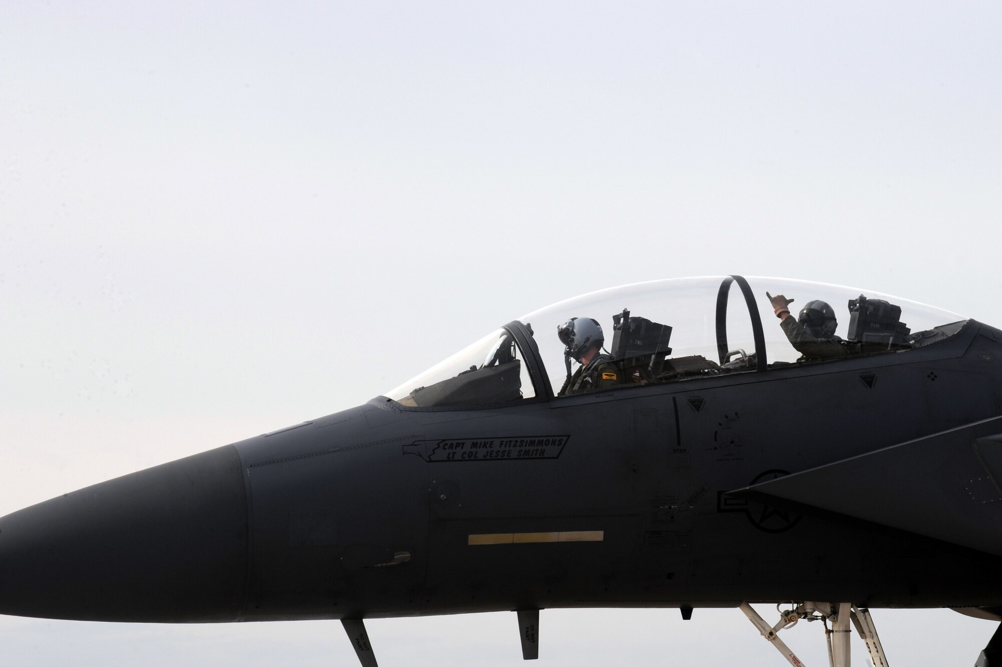 An F-15E Strike Eagle weapons systems officer shows his excitement for take off during Exercise RAZOR TALON at Seymour Johnson Air Force Base, N.C., Nov. 15, 2013. RAZOR TALON is a joint-service training exercise designed to test war-fighting capabilities during contingency operations. (U.S. Air Force photo by Airman 1st Class Aaron J. Jenne)