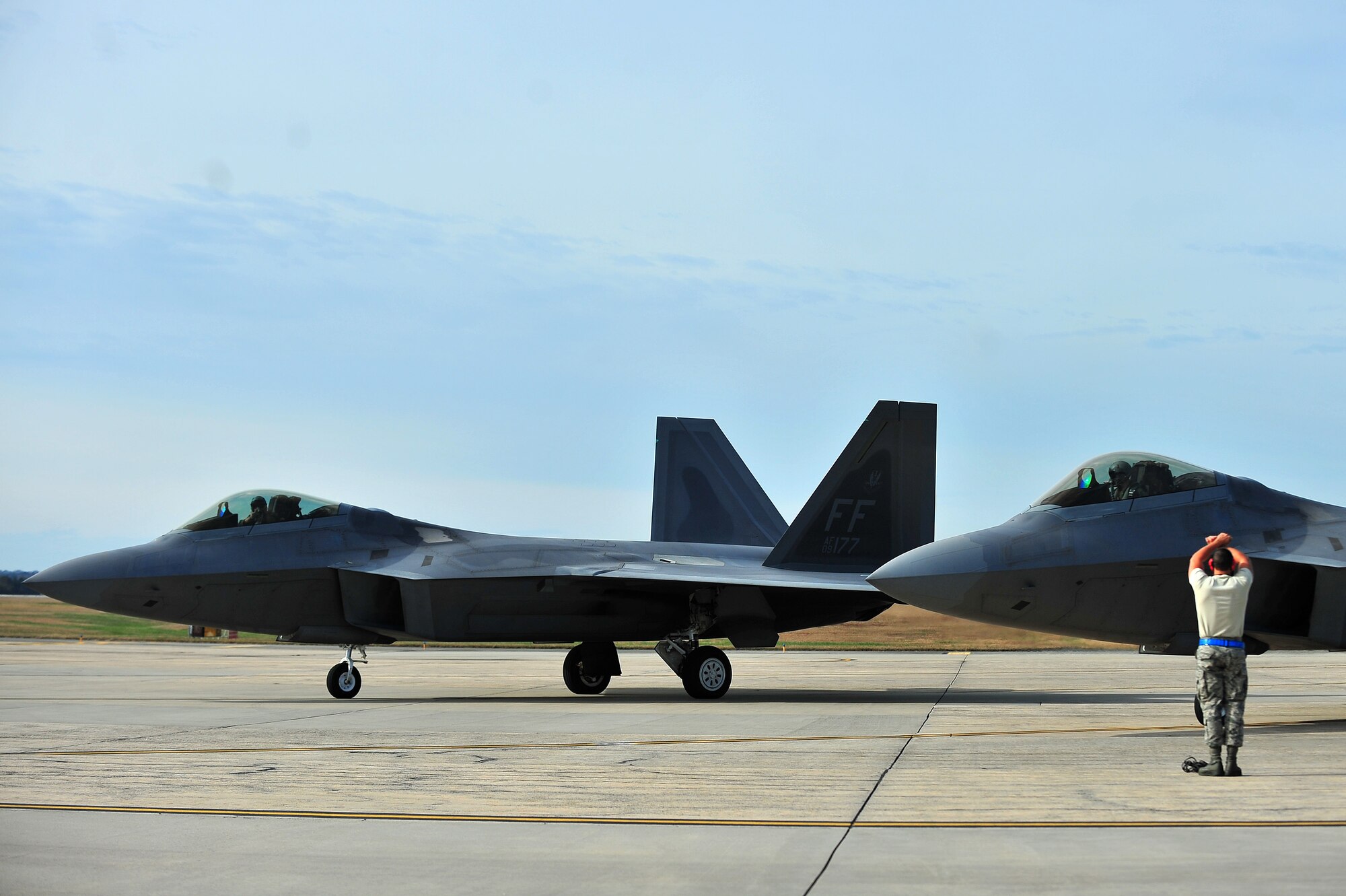 F-22 Raptor aircraft from Langley Air Force Base, Va.,  prepare for take-off at Seymour Johnson Air Force Base, N.C, during Exercise RAZOR TALON, Nov. 15, 2013. RAZOR TALON, a monthly joint-force exercise that combines resources from multiple installations across the East Coast, allows units to keep-up-to-date on air-sea training. (U.S. Air Force photo by Tech. Sgt. Brittany E. Jones)