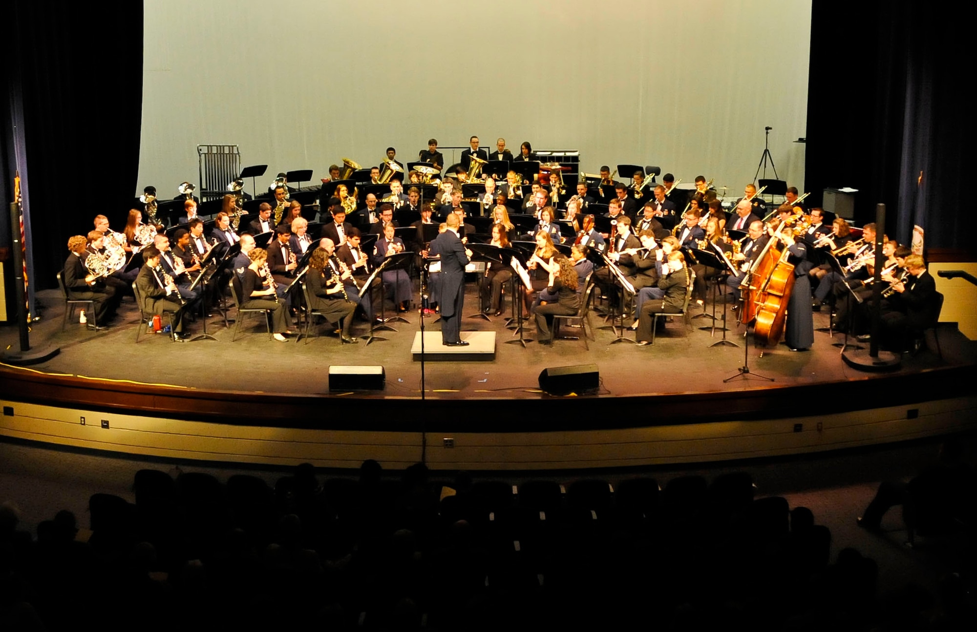 Members of the U.S. Air Force Heritage of America Band and the College of William and Mary Wind Ensemble perform during their “Side by Side” concert at Warhill High School in Williamsburg, Va., Nov. 14, 2013. The concert, which drew a crowd of more than 400 people, featured musical pieces by Aaron Copland, Leonard Bernstein and John Philip Sousa, as well as a musical salute to military veterans.  (U.S. Air Force photo by Staff Sgt. Wesley Farnsworth/ Released)