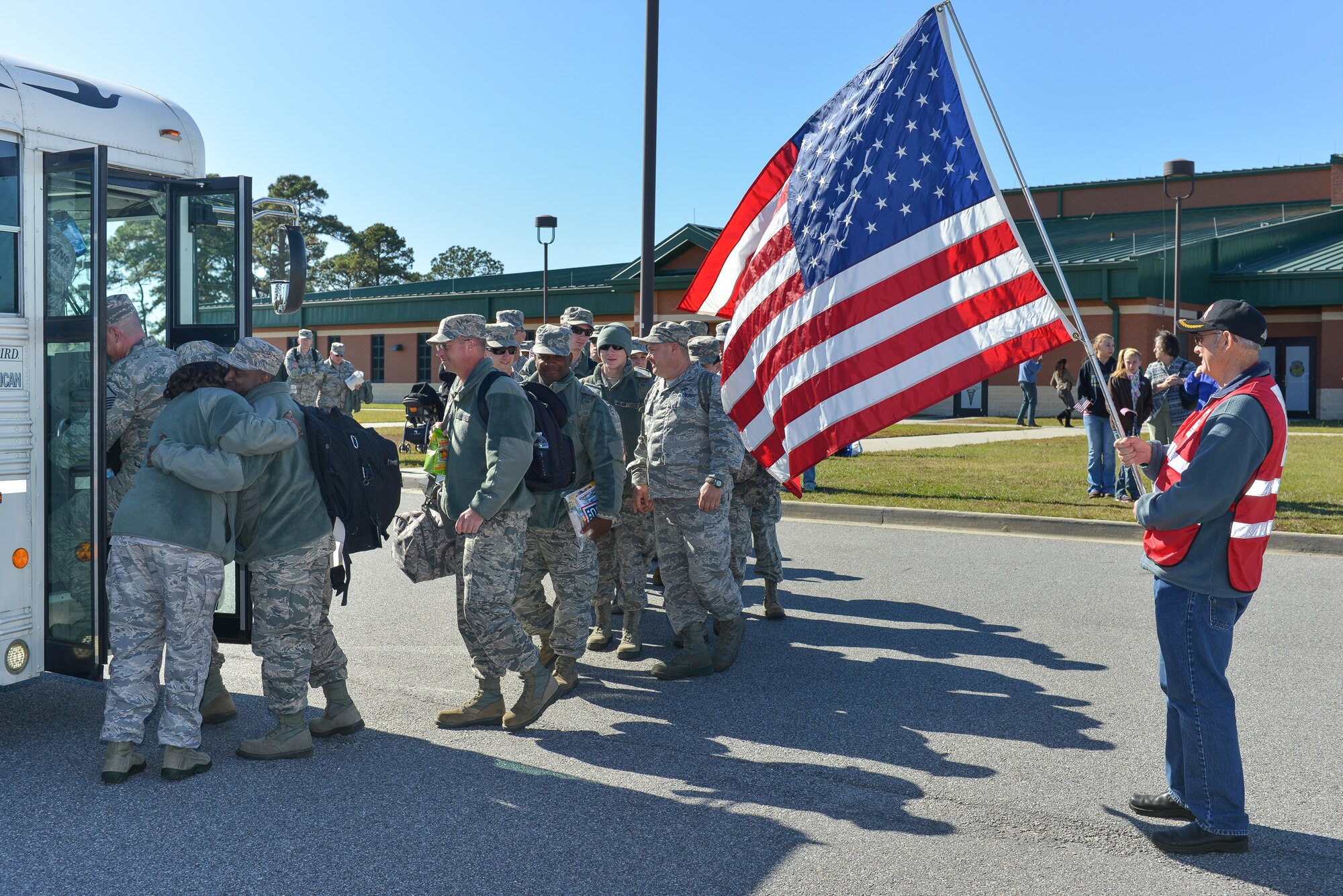 Airmen from the 117th Air Control Squadron wait for transportation, Nov. 12, 2013 at Savannah Air National Guard base in Garden City, Ga. About 110 members of 117ACS have deployed for six months to Southwest Asia in support of Operation Enduring Freedom. (U.S. Air National Guard photo by Master Sgt. Charles Delano/released)