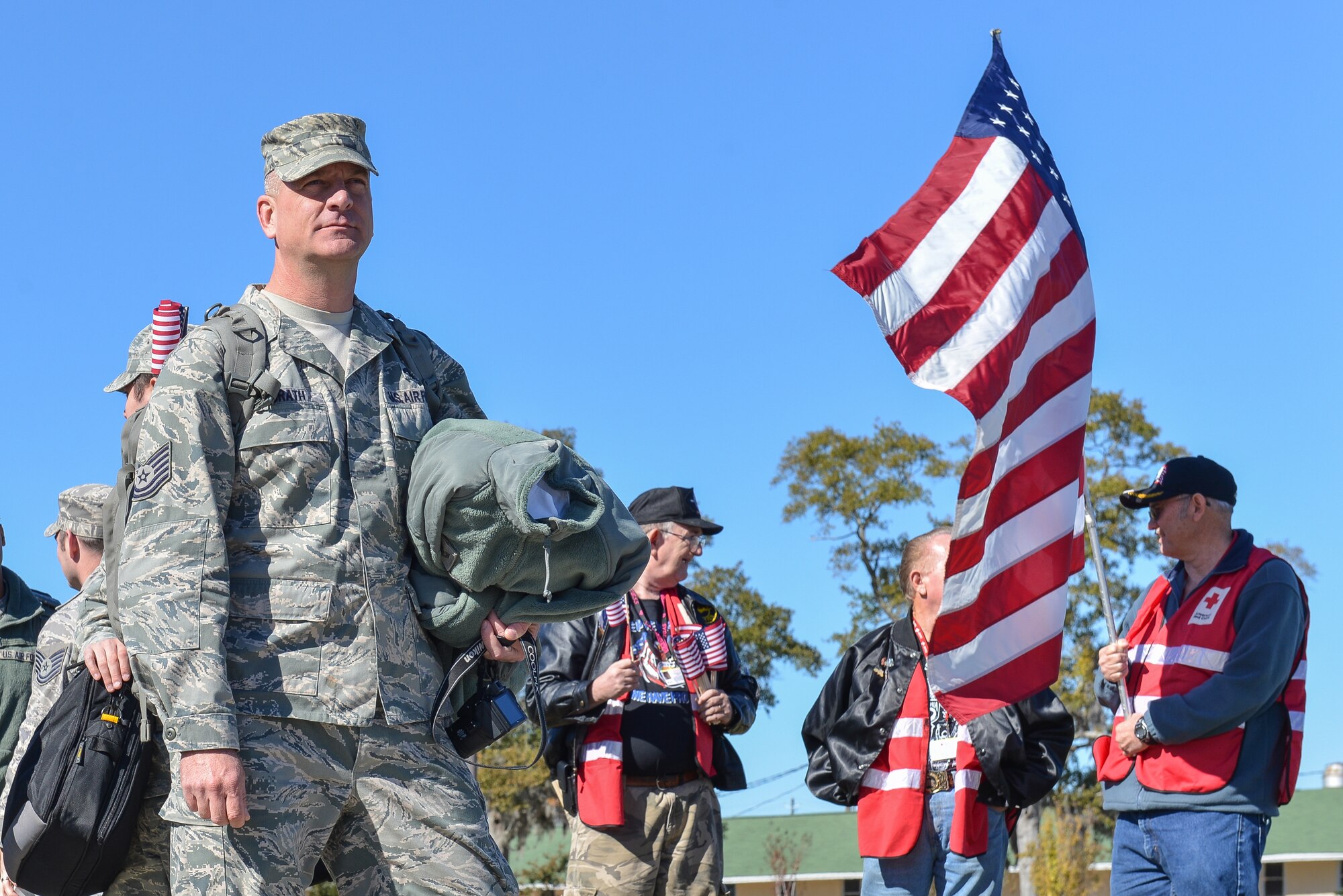 U.S. Air Force Tech. Sgt. Michael McGrath from the 117th Air Control Squadron, Georgia Air National Guard waits for transportation, Nov. 12, 2013 at Savannah Air National Guard base in Garden City, Ga. McGrath is part of about 110 members of 117ACS that deployed for six months to Southwest Asia in support of Operation Enduring Freedom. (U.S. Air National Guard photo by Master Sgt. Charles Delano/released)