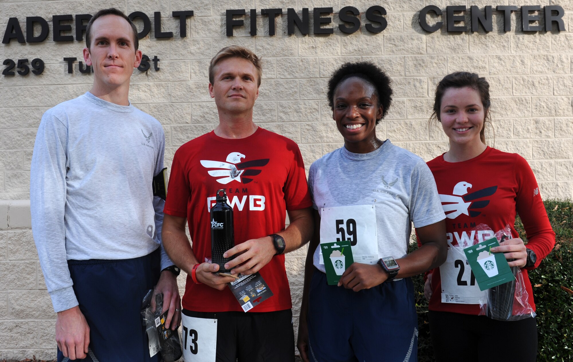 The top four finishers of the 4th annual 5k fun run pose for a photo with their prizes at the Aderholt Fitness Center on Hurlburt Field, Fla., Nov. 12, 2013. “This is the last event for [Combined Federal Campaign] for the base,” said Master Sgt. Howard Donald Jr., 1st Special Operation Logistics Readiness Squadron section chief. “We appreciate everyone coming out to show their support this year.” (U.S. Air Force photo/Senior Airman Kentavist P. Brackin)