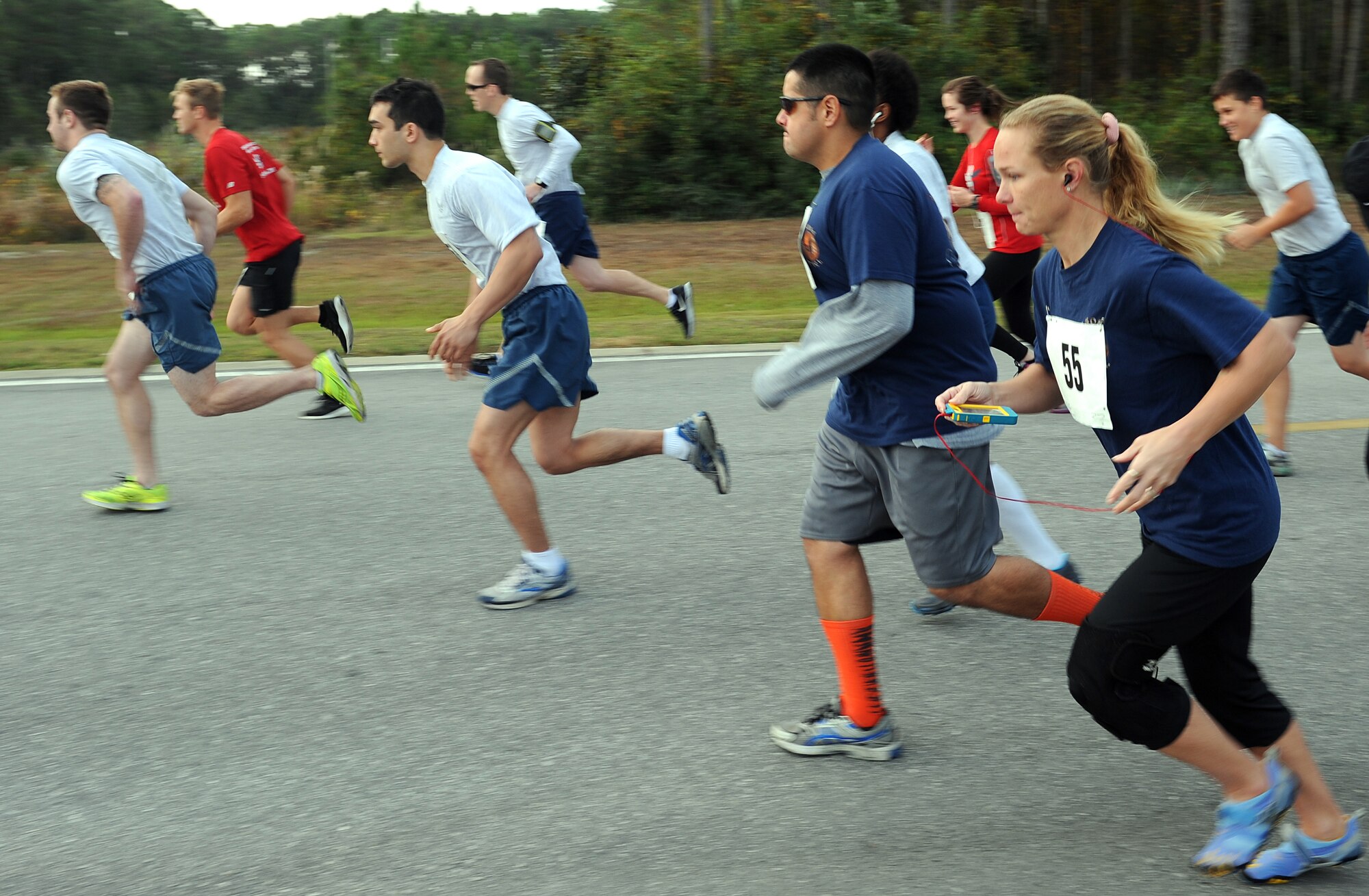 Air Commandos begin the 4th annual 5k fun run at the Aderholt Fitness Center on Hurlburt Field, Fla., Nov. 12, 2013.  The run supported the Combined Federal Campaign fundraising initiative, which is the world's largest annual workplace charity campaign. (U.S. Air Force photo/Senior Airman Kentavist P. Brackin)